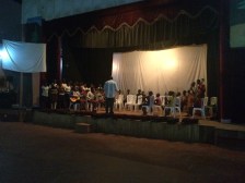 Orchestra and choir rehearsing a traditional Ugandan blessing